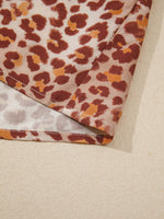 Leopard Print Smocked Notched Blouse