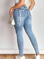 Distressed Skinny Jeans with Bow Back