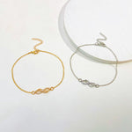 Infinity Knot Charm Bracelet