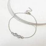 Infinity Knot Charm Bracelet