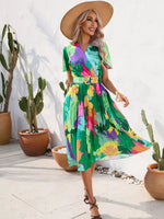 Pleated Tropical Print Belted Midi Dress