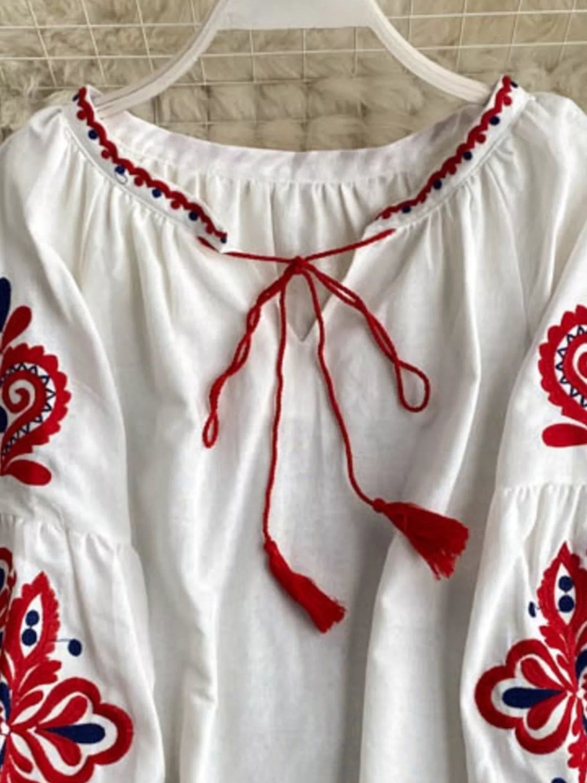 Embroidered Tassel Tie Neck Blouse