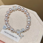 Pearl Bracelet with Bow Charm