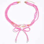 Beaded Three-Layered Necklace with Bow and Starfish Charms