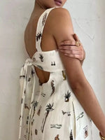 Printed Sleeveless Maxi Dress with Pockets