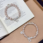 Pearl Bracelet with Bow Charm