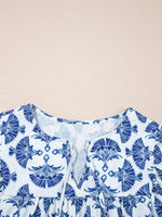 Printed Tassel Tie Neck Blouse