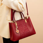 Embossed Leather Top Handle Handbag