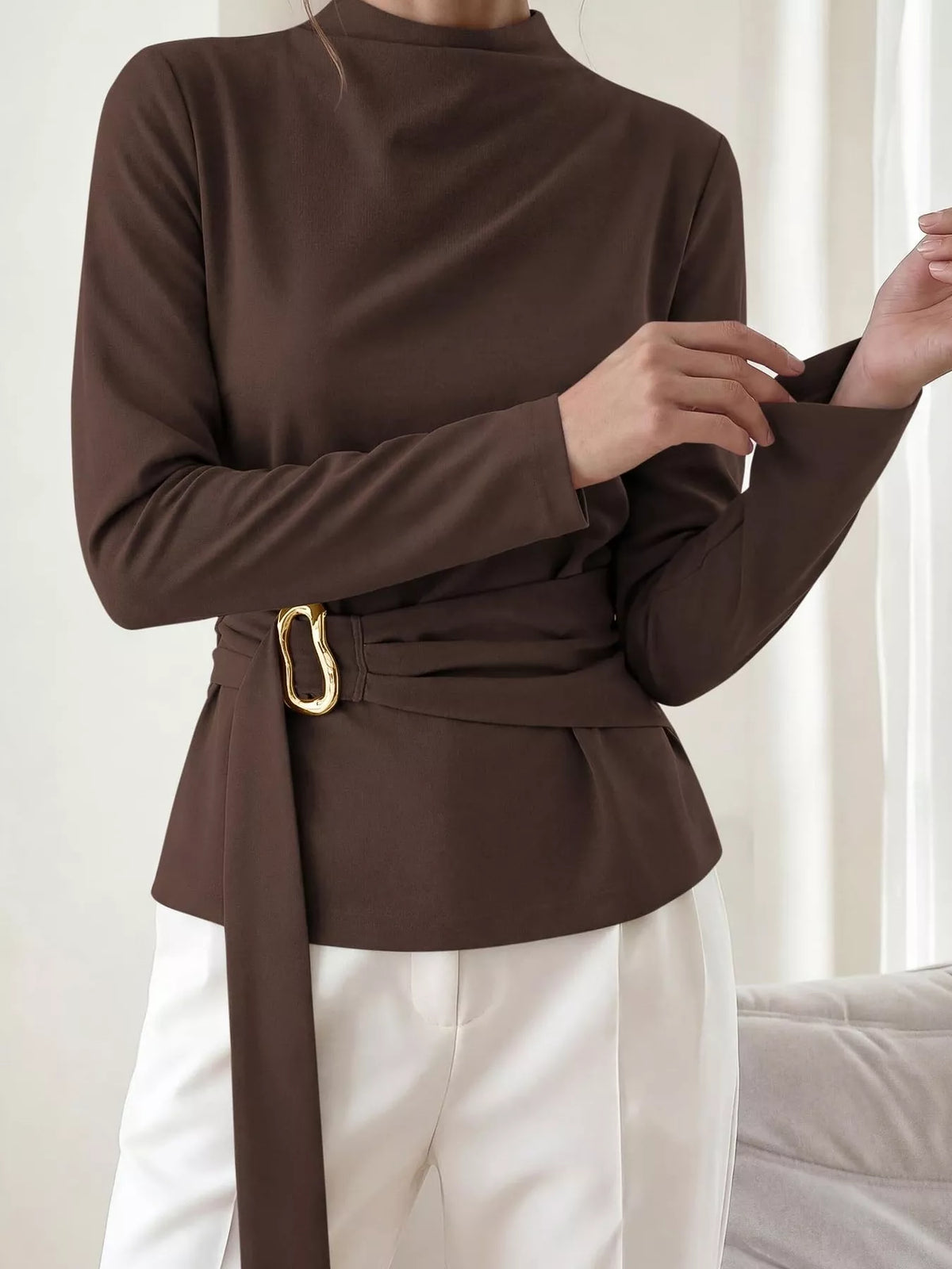Mock Neck Blouse with Waist-Defining Metal Buckle Detail