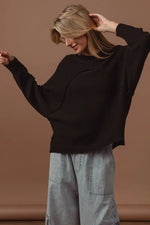 BiBi Raw Edge Arch Detailed Knit Top