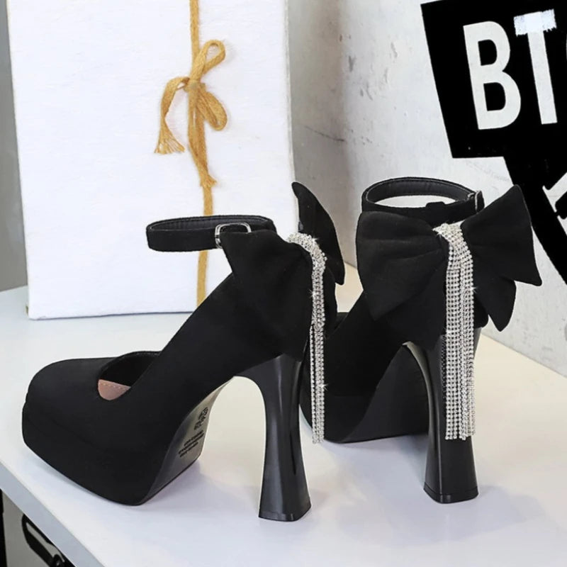 BIGTREE Women's Pointed Toe High Heels Back Bowknot Elegant Flock Ankle Strap Pumps for Women Black Dress Shoe Wedding Party