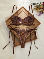 A limited edition brown and purple lace lingerie set with rose embroidery, see-through netting bra, and tie-up thong ZA825200