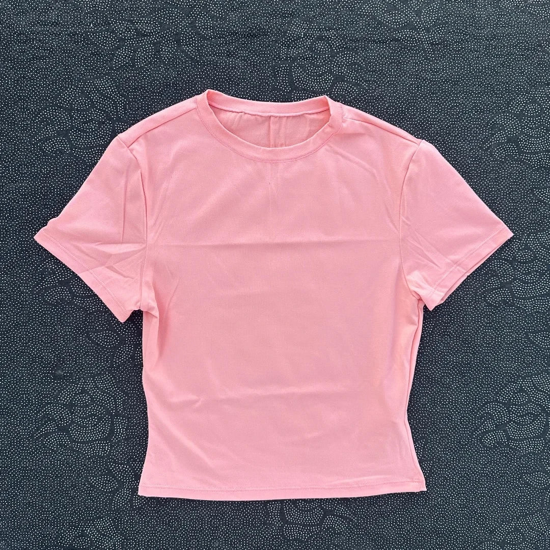 Solid color fitness women's soft breathable yoga short-sleeved comprehensive training tight T-shirt with exposed belly button