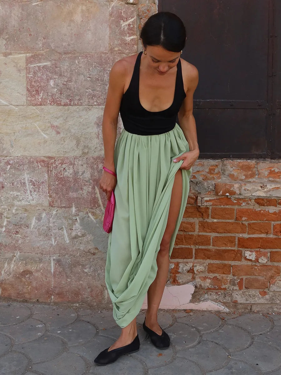 FDYOUI Elegant Solid Color Pleated Skirts for Women 2026 Chic High Slit Long Skirt High Street Office Lady Vacation Party Dress