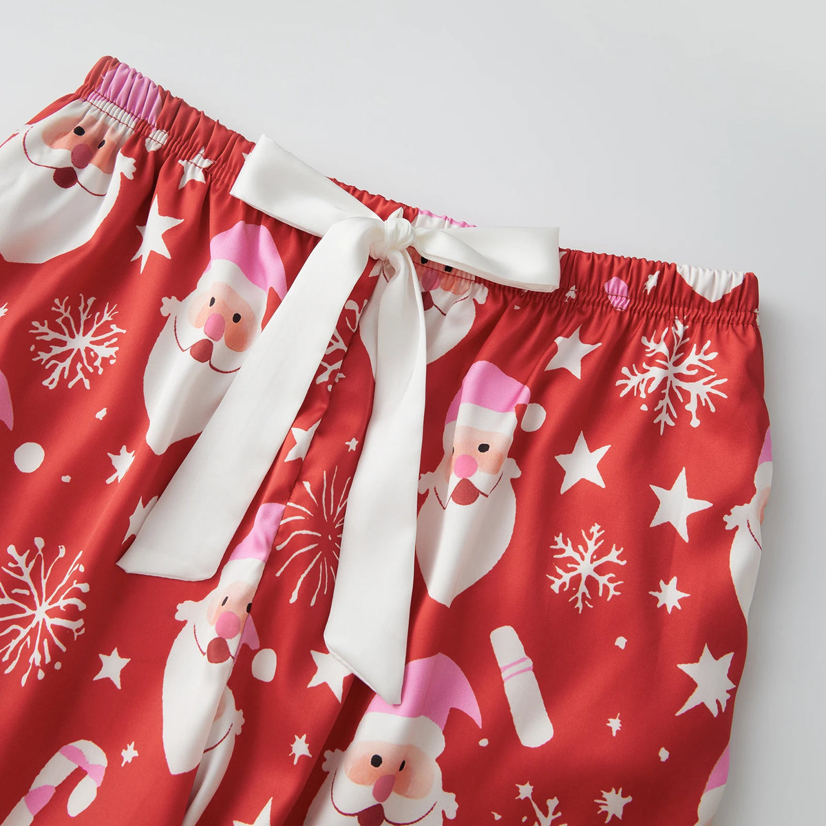Women's 2025 Christmas Pajama Sets Fashionable Santa Printed Front Tie Ruffle Tops with Pants Two Pieces Soft Sleepwear