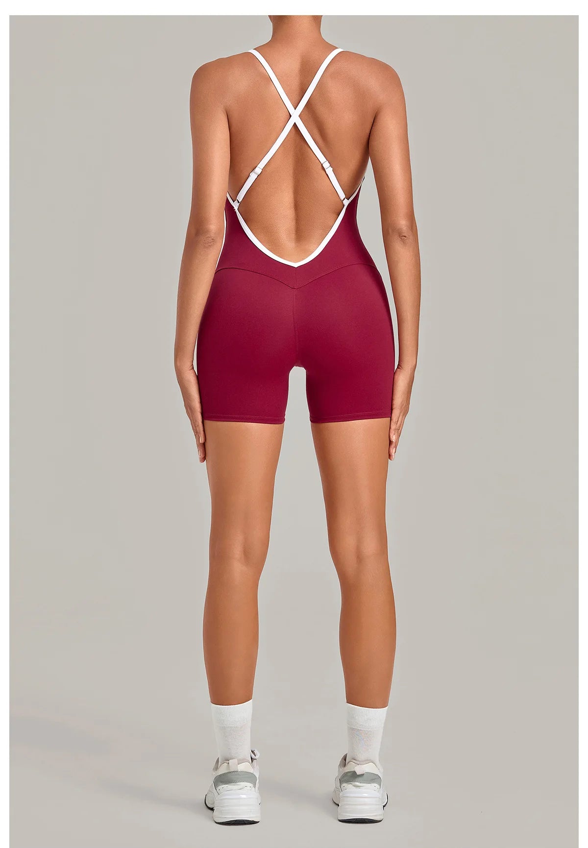 New Tight One-piece Yoga Suit Women Color Contrast Splicing Hollow Back Cross Sports Jumpsuit Outwear Slimming Fitness Bodysuits
