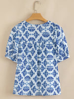 Printed Tassel Tie Neck Blouse