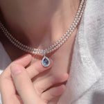 Double Layered Pearl Necklace with Teardrop Pendant