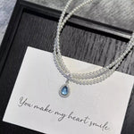 Double Layered Pearl Necklace with Teardrop Pendant