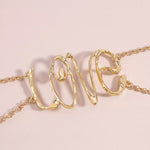 Gold Wire Love Script Statement Necklace