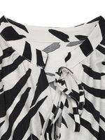 Printed Notched Sleeveless Midi Dress