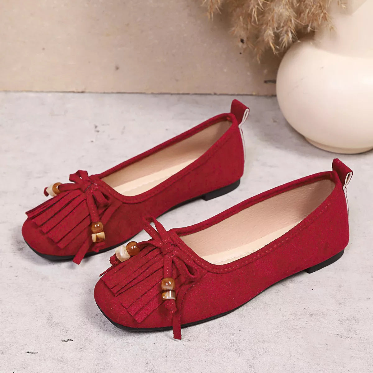 Suede Fringe Slip-Ons