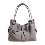 Chic Drawstring Bucket Handbag with Star Charm