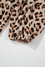 Leopard Print V-Neck Blouse with Contrast Trim