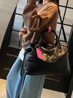 Embossed Duffle Bag