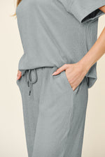 Double Take Full Size Texture Round Neck Short Sleeve T-Shirt and Wide Leg Pants - Ladyez