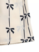 Bow Print Halter Neck Smocked Romper