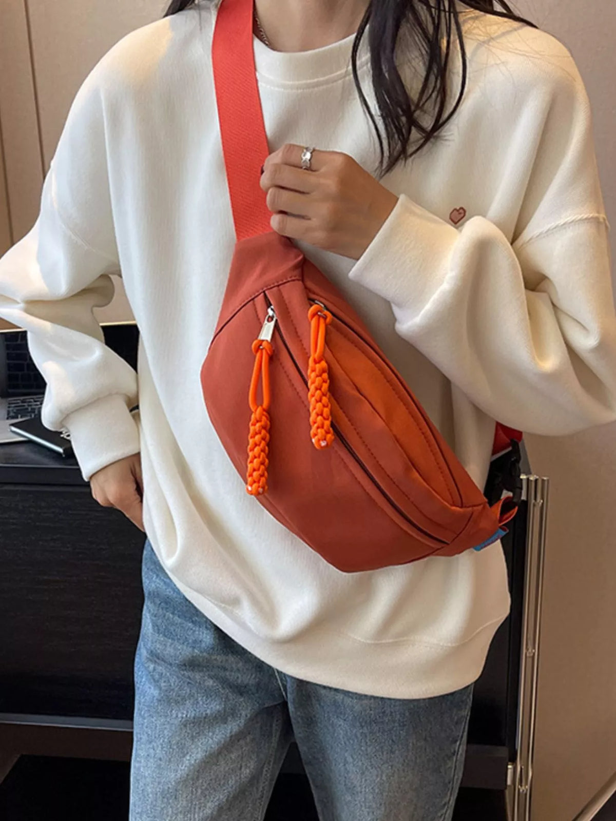 Lightweight Crossbody Bag with Tassel Detail