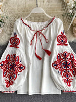Embroidered Tassel Tie Neck Blouse