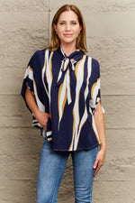 Perfee Tie Neck Printed Slit Sleeve Blouse