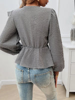 Devine Tied Round Neck Long Sleeve Blouse