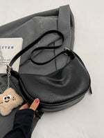 Crescent Shoulder Bag with Plush Charm