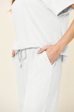 Double Take Full Size Texture Round Neck Short Sleeve T-Shirt and Wide Leg Pants - Ladyez