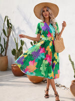 Pleated Tropical Print Belted Midi Dress