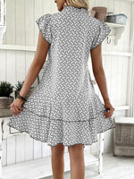 Full Size Ruffled Layered Printed Mini Dress Plus Size - Ladyez