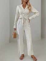 Striped Notched Long Sleeve Tie Waist Jumpsuit