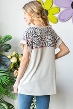Heimish Full Size Exposed Seam Leopard Short Sleeve T-Shirt