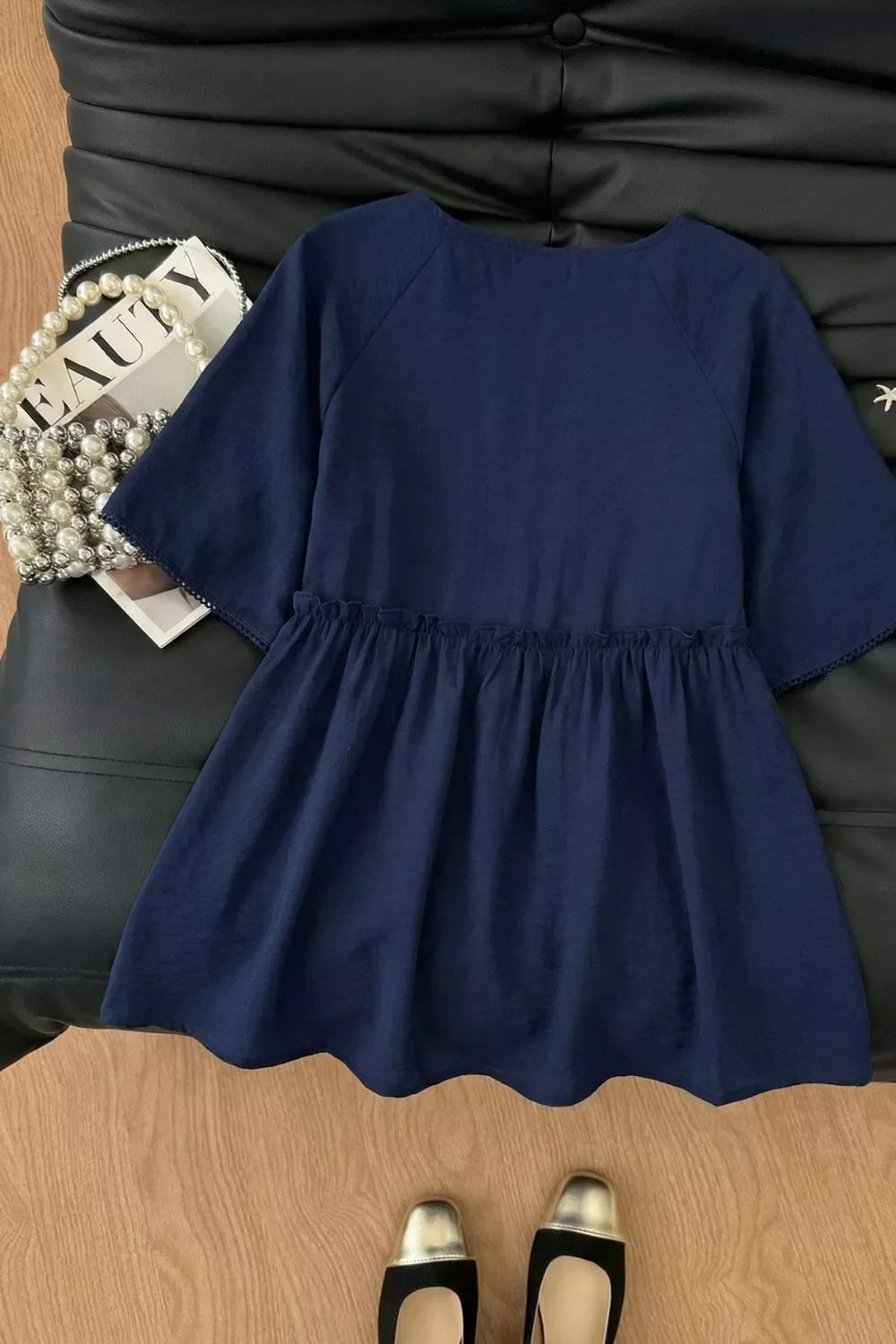 Ruffle Hem Tie Neck Blouse