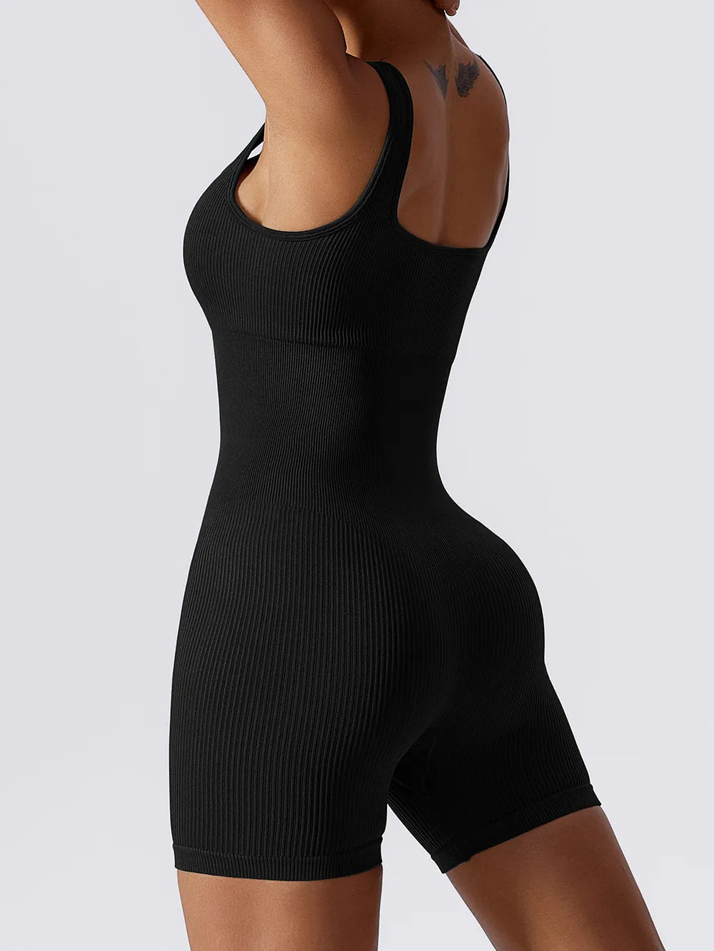Basic Bae Ribbed Sleeveless Active Romper - Ladyez