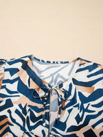 Zebra Print Tied Front Puff Sleeve Top