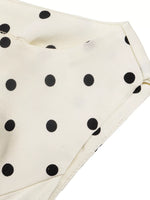 Polka Dot Sleeveless Peplum Blouse