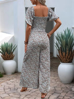 Perfee Ditsy Floral Smocked Square Neck Puff Sleeve Jumpsuit