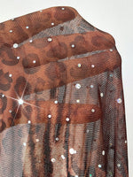 Plus-size women's V-neck leopard print long-sleeved party mini dress, featuring a shimmering sheer skirt that's perfect for part