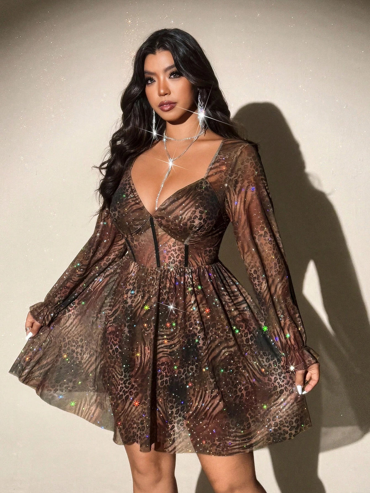 Plus-size women's V-neck leopard print long-sleeved party mini dress, featuring a shimmering sheer skirt that's perfect for part