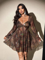 Plus-size women's V-neck leopard print long-sleeved party mini dress, featuring a shimmering sheer skirt that's perfect for part