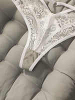 Women's sexy lace thong embroidered flower low waist hollow out seamless comfortable close fitting underwear C851
